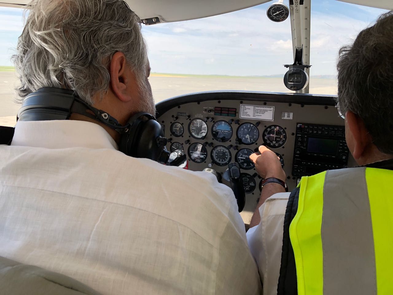 Instructor and student pilot in the cockpit